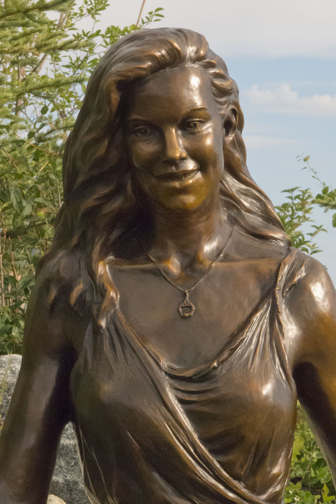 Bronze portrait sculpture of a young woman by portrait sculptor Lena Toritch